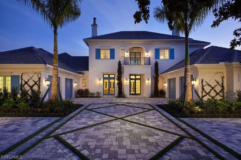 Closing Price of $4,560,000.00 includes Real Property Price of $4,057,593 & $502,407 for the value of the furnishings that conveyed outside of closing. The Avignon features breathtaking views of Quail West’s Arthur Hills-designed golf course and coveted southern exposure. Fully furnished by Romanza Interior Design, the open floor plan offers a formal dining room, study, second-floor loft and two guest suites with balconies. The kitchen, casual dining area and great room create a large gathering space, with rooms defined by beamed ceilings and archways. The first-floor owner ’s suite features a sitting area framed by a rectangular bay window, a coffered ceiling and two large walk-in closets. Sliding glass doors in the master bath reveal a garden area and outdoor shower. The outdoor living areas offer motorized screens and insect  control to enjoy uninhibited views of the golf course as you grill from the outdoor kitchen, or enjoy a relaxing swim in the custom pool, which includes a sun shelf and spa.