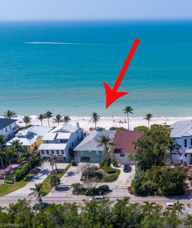 Rare opportunity to purchase a Bonita Beach direct beach front home for under $6,000,000.  Located in the most desirable part of the beach, this four bedroom, four bath home features open floorplan, three bedrooms with ensuite, powder bath, two sided wood fireplace opening to great room and dining area, and hurricane shutters.  This high rental income property is offered turnkey furnished.