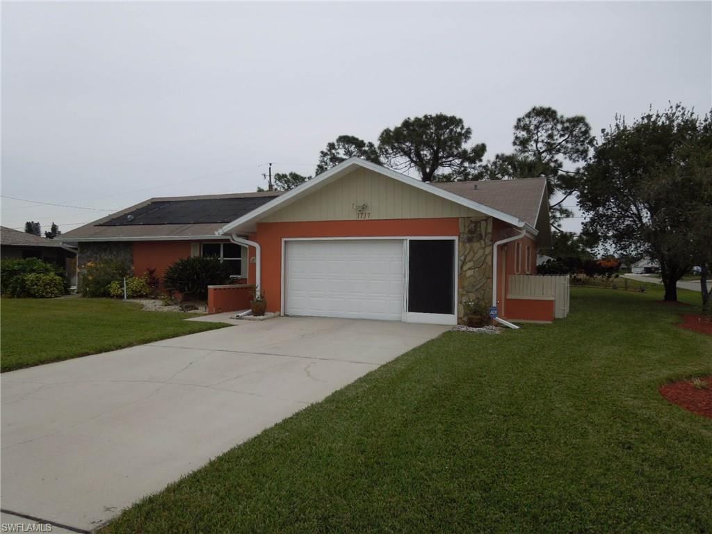 Must see pool home in desirable Country Club Estates. Corner lot, central water & sewer, cathedral ceilings, formal living, dining, and a family room, two master suites, split floor plan. Remodeled kitchen with wood cabinets & granite counter tops, newer wood like flooring though most of the home. French doors from the living room lead to screened pool area which has ample room for entertaining, pool is solar heated. Nice landscaping has great curb appeal. This is move in ready. Call and schedule you appointment you wont be disappointed.