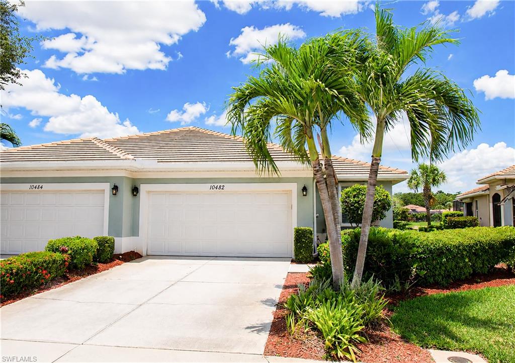 Welcome to paradise in this well maintained, shows like a model, Milan floor plan boasting a gorgeous lake view with extended lanai. DON'T WAIT AND MISS THE OPPORTUNITY TO OWN THIS 2-CAR GARAGE VILLA FOR THE PRICE OF A CONDO! NO CARPET in the home - the main area and bathrooms feature tile, with Luxury Vinyl Plank in the bedrooms. The 42" solid wood kitchen cabinets are completed by granite counters, an attractive backsplash, and kitchen bar seating. The  master bath has a new seamless glass My Shower Door and walk-in tiled shower. The laundry room has been remodeled, plumbed for a sink and has lots of storage. A/C REPLACED 2023, WATER HEATER 2024, HOA COVERS ROOF CLEANING AND EXTERIOR PAINT. Enjoy the luxury feel of plantation shutters to filter light/heat. Exterior features include ACCORDION STORM SHUTTERS on windows and ELECTRIC STORM SHUTTER on lanai - a nearly $15k value. Plus the sellers are offering a 1-year home warranty. 2019 Club Golf Cart included with the sale of the home with an acceptable offer. Pelican Preserve is one of Southwest Florida’s Premier 55+ Communities offering Golf, Dining, Fitness, Pickleball, Softball, Social Activities, and Resort-Style Amenities. Plus, Pelican Preserve is conveniently located close to RSW Airport, Shopping & THE BEACHES!