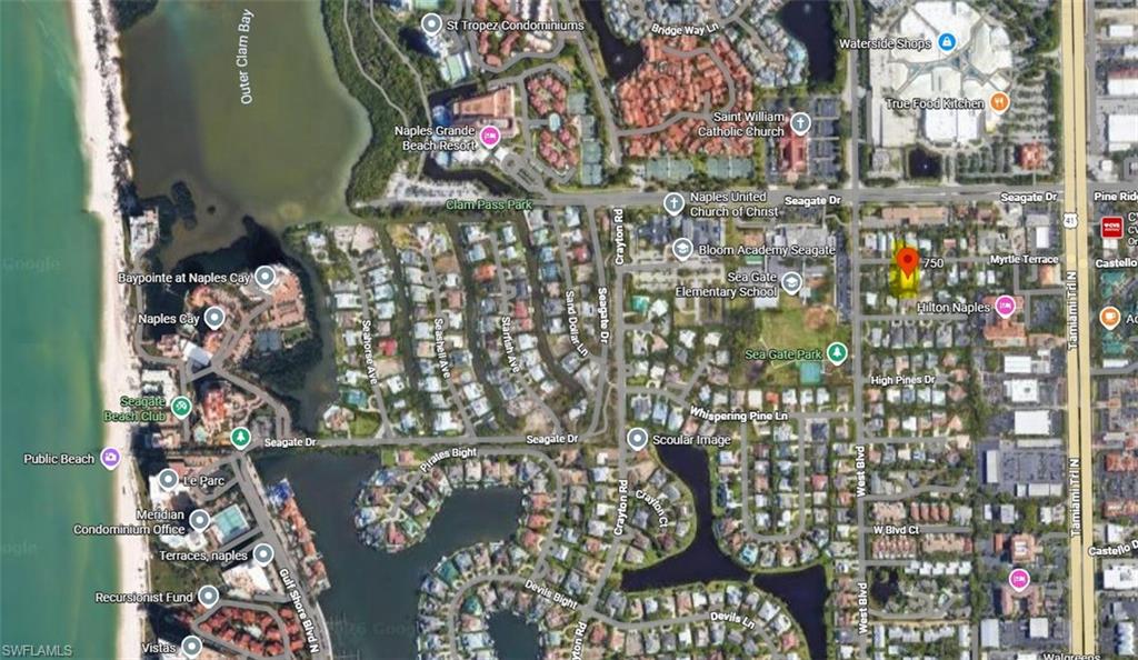 NEW LISTING!  Ideally located west of U.S. 41, this exceptional homesite offers a level of walkability that is virtually unmatched in Naples. Just a short walk to Waterside Shops, featuring upscale dining and retail, and directly across from Pelican Bay, the setting places everyday conveniences and lifestyle amenities within easy reach.              Southern exposure, no HOA fees, and a quiet cul-de-sac street of just 15 homes further enhance the appeal.                                                                                                                                                         A scenic walk leads to Clam Pass, where you can stroll through the preserve or take the tram to the beach, enjoy the rare beachfront restaurant and bar, and take in sunset views. Directly across the street is Naples Grande Beach Resort, offering a full-service spa and five on-site restaurants. Close to Artis—Naples, Southwest Florida’s premier performing arts venue, as well as Seagate Elementary School, consistently ranked among the top elementary schools in Naples, and Kunjani, the neighborhood’s organic craft coffee shop and gallery.                                                                                                                                                                                                                                                              Elevated at approximately 14–15 feet, the lot remained high and dry through recent storm events that impacted much of the surrounding area. As a result, the property does not require flood insurance and allows for a more traditionally proportioned home design without excessive elevation or long stair runs. Much of the surrounding area west of U.S. 41 has already transitioned to newer homes following recent storms. This street evolved more gradually due to its natural storm resilience, representing one of the few remaining opportunities to build within a largely redeveloped, highly desirable corridor.                                                                                                                                                                                                                                                                                                                                                                    The homesite is cleared and ready to build, with permitting currently in process for a custom residence of approximately 3,900 square feet under air. Current plans reflect a thoughtfully designed, architecturally refined custom home, scaled appropriately for both the homesite and its walkable setting. For a limited time, there remains an opportunity to make refinements to the plans prior to final approval. Sample designs are available. Priced competitively relative to recent sales, this offering represents a compelling opportunity in one of Naples’ most walkable west-of-41 locations.