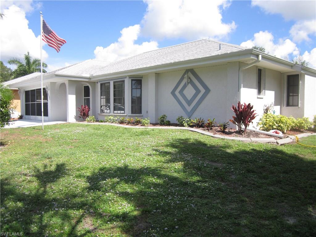 Comfortable Florida living in this spacious home. Quiet sought after neighborhood in Central Port Charlotte. Relax on the large 35x15 screen lanai with view of mature orange and grapefruit trees. Home features Living room and Family room areas with walk through Kitchen. Inside laundry. Walk in closets in every bedroom. Hurricane Shutters. Home also has a storage building in the rear large enough to use as a workshop or garden shed (10x16) . Don't  miss this opportunity. Irrigation is not warranted. Minutes to dining, shopping, entertainment and Hospitals. Home is being sold "as-is"