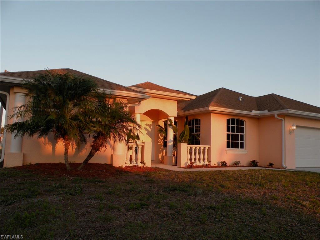 River Access Home ( via deeded Boat Basin with Docks ) : Move in Ready, Freshly Painted and Cleaned Built in 2005 and Located in a great neighborhood, minutes to Caloosahatchee River. Very spacious Great Room plan with Vaulted Ceilings and Tiles throughout the entire home, Maple Cabinets, Large Lanai under trusses, glass block walk-thru shower. No community fees, the private boat basin ramp and docks within walking distance.