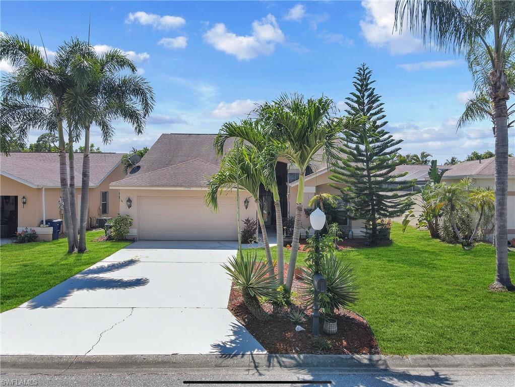 What awaits you here, is the Floridian Paradise lifestyle in this beautiful, bright, and airy 3 bedroom, 2 bath single-family home! It is located on a very aesthetically pleasing landscaped lot at The Islands in the much desirable community of Three Oaks. Low HOA fees here that include a community pool, clubhouse, and tennis courts for your leisure. In an ideal location of being close to I-75, Gulfcoast Town Center, Coconut Point Mall, SWFL International Airport, Parks, & Restaurants.There is vaulted ceiling in the Master Suite, transom windows, slider to the land, and 2 walk-in closets. The master bath has a walk-in shower and a separate tub. Secondary bedrooms are split from the master suite for privacy. Kitchen is very open & inviting, eat-in-kitchen design with stainless steel appliances and granite counter tops. Living room area has tile flooring throughout, a cool aviation style fan it’s vaulted ceiling. Backyard has plenty of space for tons of activities. Schedule your showing!