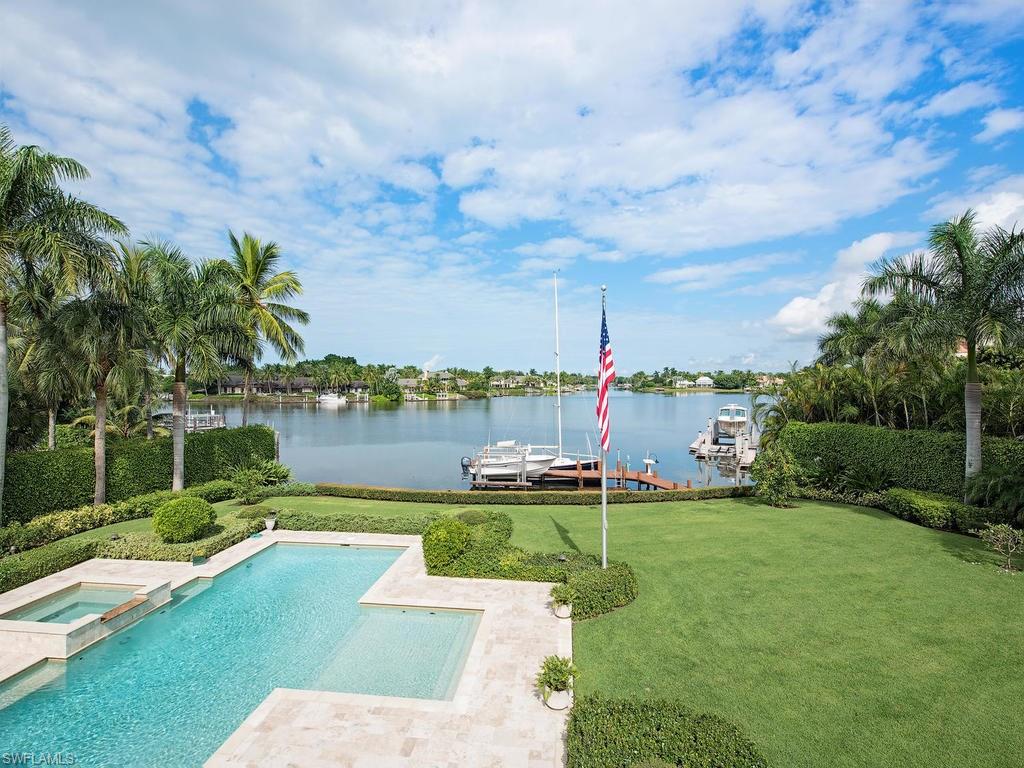 One of the most beautiful properties in Port Royal.  Custom built by the Williams Group with long, wide water views.  Nearly an acre, this property has an expansive front yard and a very large backyard. High end finishes include  Chapman chandeliers and fixtures, Waterford sconces and chandeliers, Baldwin hardware, Windows KML, kitchen & butlers pantry are William OHS, AlliKriste cabinetry throughout . There is a screened lanai and wonderful outdoor patio areas.  Spacious master suite, library and oversized guest suites with separate cabana.  Oversized 4 car garage.  This is one of a kind custom estate.