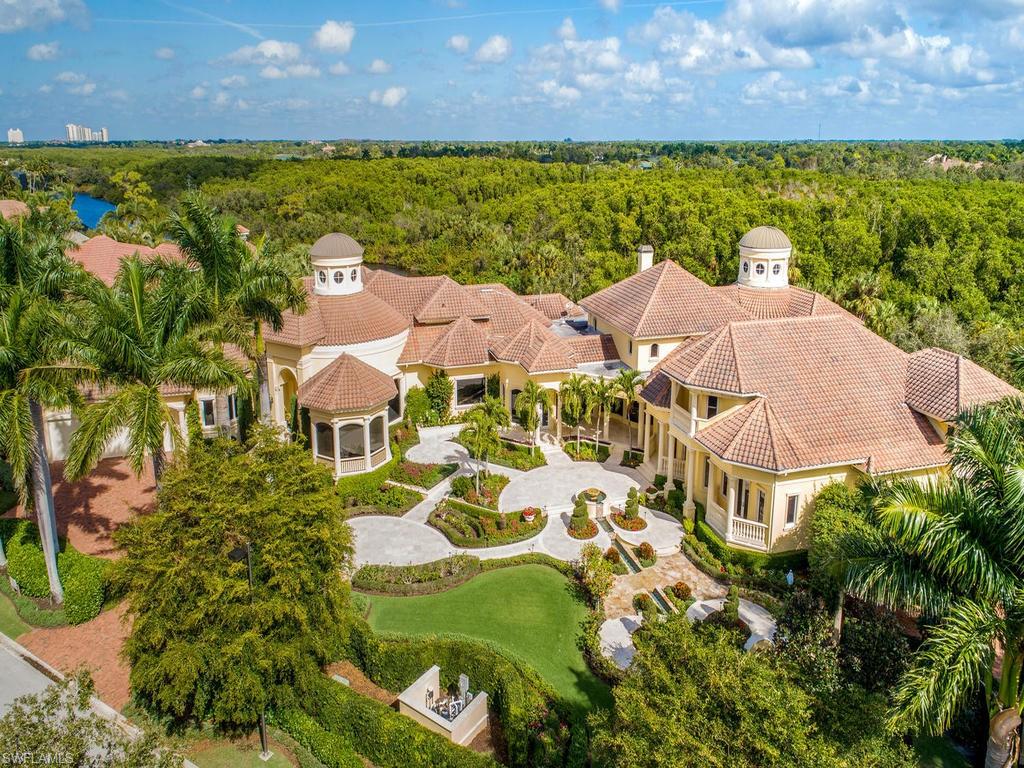 H.14009 - Previously staged but now being offered fully furnished with beautiful, brand new furnishings, INCLUDED in the price! Come and live the Bonita Bay dream lifestyle! Seller will consider a trade, perhaps some creative financing on this 14,363 sq.ft. A/C home! Ground floor master suite is gorgeous, and every room has a beautiful garden view! Truly a grand estate with seven bedroom suites, a theater room, game room, billiards room and more.  Bonita Bay's show-stopper! The lavish pool and sunning patios are ideal for entertaining or enjoying privately, amidst the immaculate, palatial grounds, mature trees, meticulously groomed gardens and lovely water features. Situated on a double lakefront lot, 1.3 acres in Bay Woods, the exquisite craftsmanship, and stellar finishes are sure to excite and delight even the most discriminating of buyers. This property exudes European charm from the minute you pull up to the motor court. For the car enthusiast, there is a five car collector's garage. Bonita Bay is one of SW Florida's premiere golf communities with an active Country Club lifestyle,  private beach club and marina, 54 holes of championship golf and state of the art amenities.
