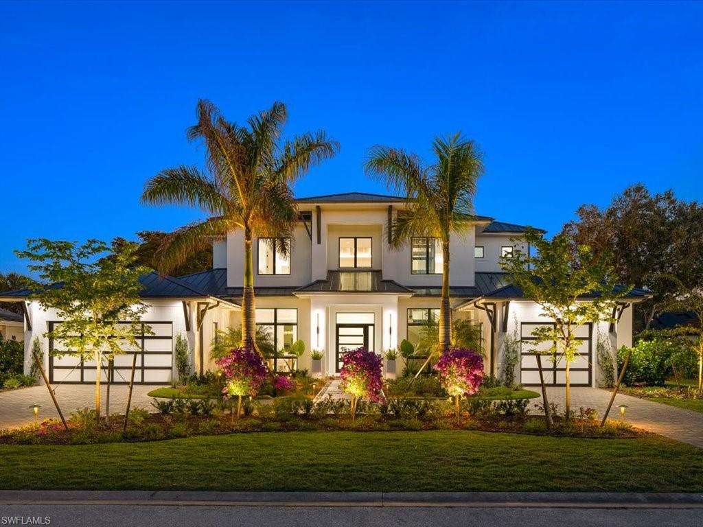 Discover the epitome of sophistication and elegance in this stunning 5-bedroom contemporary coastal new construction home, ideally situated on a serene cul-de-sac in the highly sought-after community of Pelican Bay. 

As you enter through the impressive front pivot door, you'll be greeted by soaring ceilings and a spacious open floor plan that seamlessly connects the various living spaces. The sleek Chef's kitchen is a culinary paradise, featuring double islands, high-end Wolf and Sub-Zero appliances—including a range with double ovens and an additional wall oven—perfect for entertaining.

The great room, designed with two-story ceilings and massive windows, floods the home with natural light, creating an inviting atmosphere. The expansive primary suite offers two large closets and a luxurious primary bathroom, complete with a shower for two and dual water closets. The first floor also boasts a VIP en-suite as well as a private study, ideal for remote work.

Take the private elevator to the second floor, where you’ll find a loft area and three additional bedroom suites, providing ample space for family and guests. Step outside to the fenced backyard oasis, featuring an oversized saltwater pool and spa with custom features, an outdoor kitchen, four fire features, and generous covered lanai space, all surrounded by lush landscaping that ensures complete privacy.

Additional highlights include a whole home generator fueled by a 1,000-gallon propane tank and a three-car garage with beautifully finished floors. Residents of Pelican Bay enjoy exclusive access to two private beach clubs, each with a restaurant and bar, along with access to a state-of-the-art fitness center, tennis courts, canoeing, kayaking, paddleboarding, and miles of walking and biking trails, with upcoming private pickle ball courts as well.

With three miles of deeded beach access just minutes away and the luxury shopping and fine dining options at Waterside Shops within walking distance, along with Mercato Shopping a short three-minute drive away and the renowned restaurants of 5th Avenue South less than 15 minutes away, this home is a true gem. 

Experience the ultimate in Naples living—schedule your private showing today!