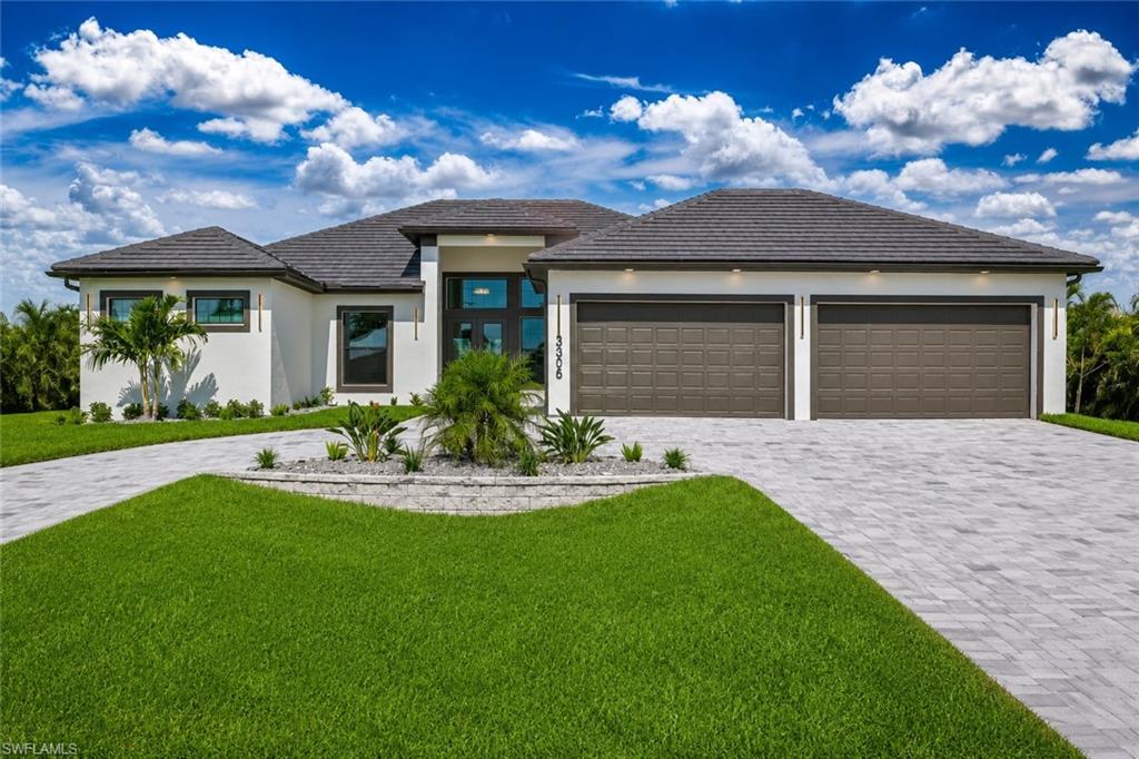 Welcome to this spectacular 2026 custom-built, turnkey furnished Gulf Access estate!   Perfectly situated on an oversized waterfront homesite, this stunning **5-bedroom, 4-bath** home offers a rare combination of elegance, comfort, and flexibility—including a luxurious primary suite, **two private junior suites with ensuite baths**, and two additional bedrooms that can easily serve as a home office, fitness studio, media room, or hobby space.

From the moment you arrive, you'll be captivated by the home's striking modern architecture, professionally landscaped grounds, **massive brick paver circular driveway**, and impressive **oversized 4-car garage**, creating unforgettable curb appeal.

Inside, soaring ceilings and expansive walls of glass flood the home with natural light, highlighting the open-concept design and sophisticated finishes throughout. The dramatic great room is anchored by a stunning sleek linear fireplace and custom entertainment center with dramatic back lighting, creating the perfect setting for entertaining or relaxing in style.

The gourmet chef's kitchen is equally impressive, featuring **quartz countertops**, premium **GE Profile stainless steel appliances**, a convenient **pot filler**, custom cabinetry, an oversized center island, and an enormous walk-in pantry designed for both beauty and functionality.

The luxurious primary retreat offers a spa-inspired escape with designer finishes, while every room showcases wide-plank tile flooring, upgraded lighting, and impeccable attention to detail.

Step outside to your own private waterfront paradise, where a spacious covered lanai, resort-style pool and spa, and beautiful Gulf access canal views invite endless days of boating, entertaining, and enjoying breathtaking Florida sunsets. Enjoy entertaining with your custom outdoor Kitchen with mood lighting.

**Being offered turnkey furnished**, this exceptional residence allows you to move right in and immediately begin enjoying the luxury waterfront lifestyle you've been dreaming about. Built in **2026** with modern efficiency and premium construction, this one-of-a-kind home is a rare opportunity to own a showpiece Gulf access estate featuring luxury finishes, incredible indoor-outdoor living, an oversized lot, and an expansive **4-car garage**.