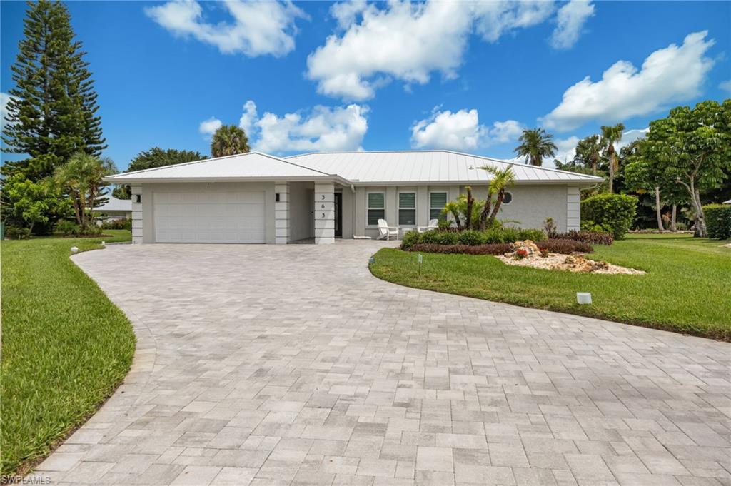 Rarely available and extensively updated, this Palm River home sits on an oversized cul-de-sac lot with private LaPlaya Golf Course views, a brand-new heated pool, and a location just minutes from Vanderbilt Beach and Mercato. Combining privacy, space, and modern upgrades, this move-in-ready home offers a rare opportunity east of US-41 and west of Airport Rd with the flexibility of a voluntary HOA.

Thoughtfully improved for today's lifestyle, the home features impact-resistant windows and sliders, a durable metal roof, a new A/C system, updated water heater, and a recently added flex room perfect for a home office, hobby space, media room, or guest accommodations. Light-filled living areas flow seamlessly to the outdoor spaces, creating an inviting environment for both everyday living and entertaining.

The backyard is a standout feature, highlighted by a newly constructed heated pool, expansive pool deck, covered outdoor living area, and sweeping golf course views. Whether enjoying a quiet morning coffee or hosting friends for an evening gathering, the setting offers a true Southwest Florida lifestyle experience.

Located just minutes from Vanderbilt Beach, Mercato, Waterside Shops, dining, shopping, parks, and everyday conveniences, this home delivers an exceptional combination of location, comfort, and long-term value. With no mandatory HOA and significant recent improvements already completed, this is a property that allows you to spend less time on projects and more time enjoying everything Naples has to offer.