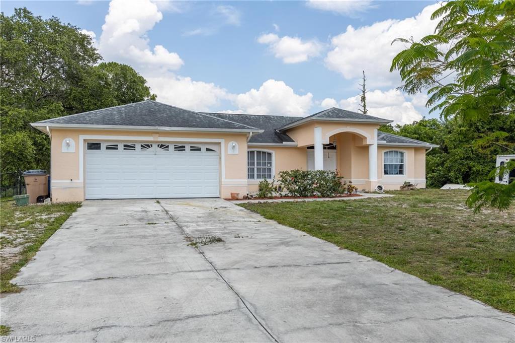 Beautiful spacious 3 bedroom 2 bath home sitting on oversized half acre lot. At 2,073 living sq feet this 3/2 is larger then most, providing spacious bedrooms and a huge screened lanai. New Ac installed less then 2 years ago still under warranty.  This home has been beautifully maintained. Priced to sell!! Come see this home now as it will not last.