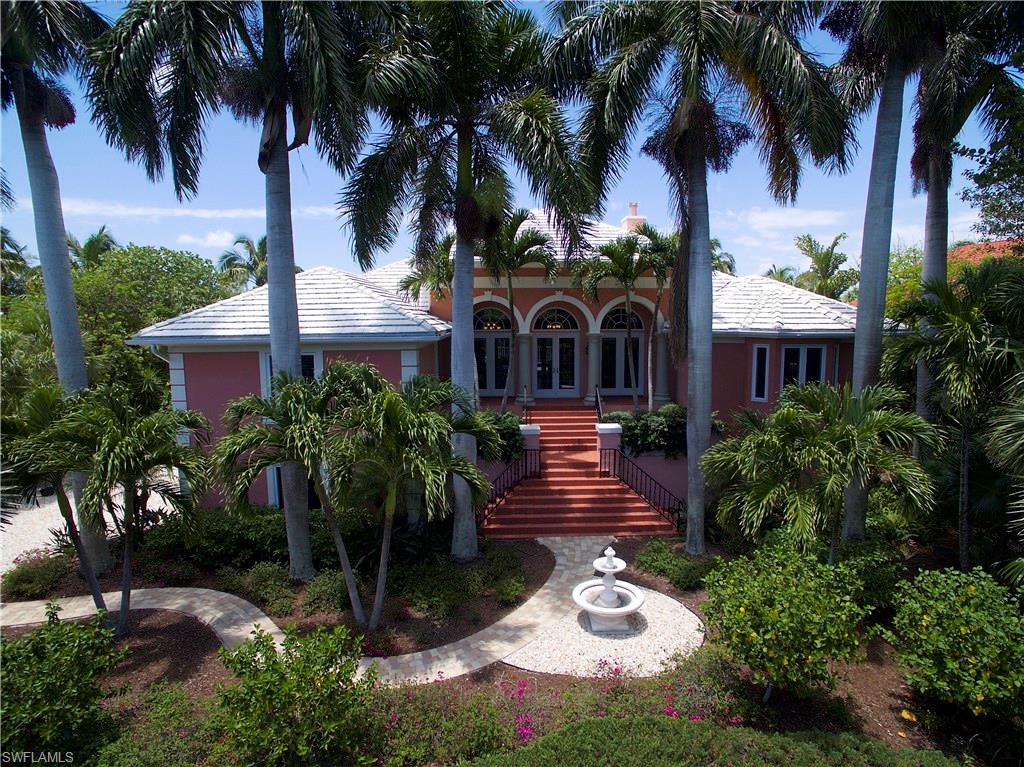 Private & Intimate setting within the gated exclusive Kinzie Island, on Sanibel Island. Wonderful remodeled residence flowing out to a beautiful raised pool area. Pool bath, sauna, all new impact windows & doors, newer kitchen includes stainless appliances. All updated bathrooms and gorgeous flooring throughout. New A/C & new whole house generator. Concrete block construction offering oversized garage & storage. 10,000lb private boat dock & lift outside your back door. Unique beach cabana & beach storage locker alongside your private beach access. Tennis, pickleball courts, shuffle board, basketball court in addition to a community lap pool. A very special situation for a special family in a low density community. Check out video walk thru.
