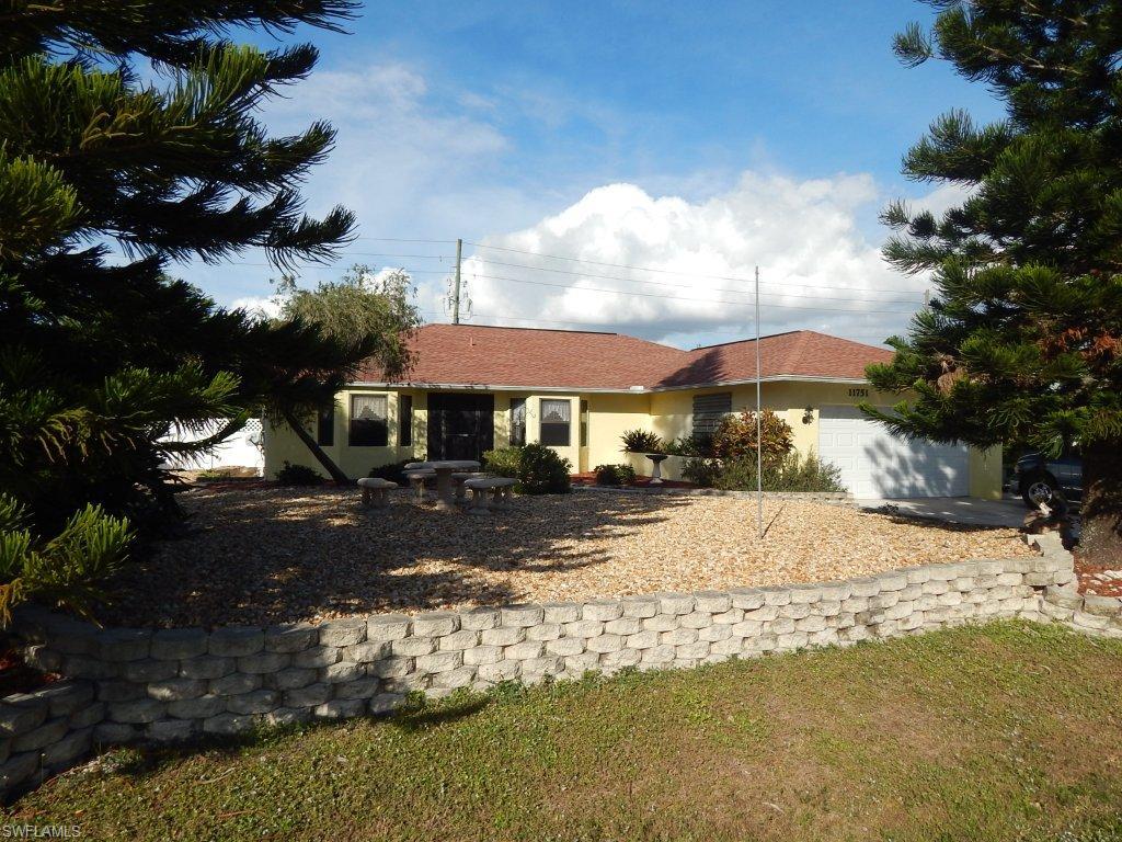 Looking for an affordable 2 bedroom + den, 2 bath (could easily be 3/2), 2 car garage with pool and spa in a great location in Bonita Springs?  This well maintained home in Aroyal Pines offers a lot of home plus a pool & spa on a large, well landscaped paver deck.  Original plans for this home included 3 bedrooms and 2 baths.  The owners choose to open the third bedroom into the living room and use it a den. It could be converted back to the 3rd bedroom.  This home is equipped with impact glass windows and doors on the back and storm shutters on the front and sides.  Aroyal pines is conveniently located just east of downtown Bonita and close to US41, I75, Bonita Beach, shopping, restaurants, FGCU and more.