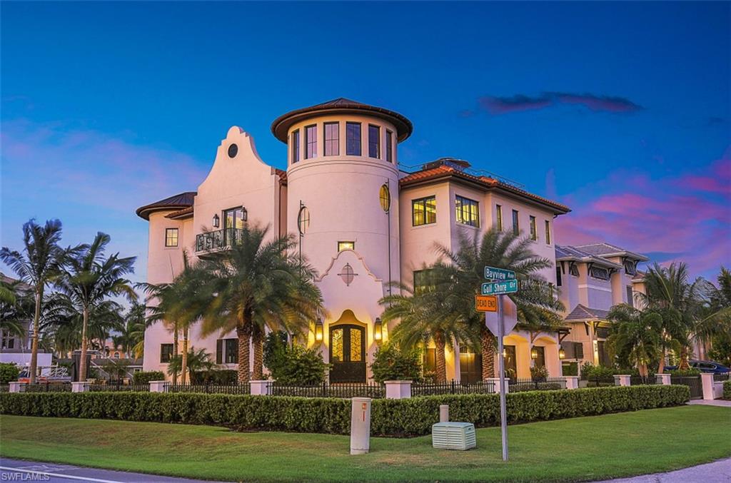 Dreaming of an idyllic and luxurious waterfront lifestyle like no other? Set the standard with this show-stopping residence on the canal with a chance to keep your boat in your backyard while also having Naples pristine sugar sand beach just across the street. You will fall in love with this home even before stepping inside.

The dramatic foyer showcases stone walls and trim along with a curved ornate stairway with feature tile. Every detail has been designed for pure opulence, like the stunning family room with a fireplace, a soaring ceiling and a wet bar to the formal dining room with a vaulted ceiling. The kitchen is a gourmet oasis complete with a farmhouse-style sink and high-end appliances. There’s a spectacular wine room, a first-floor kitchen, and a third-floor family room. This luxe space offers gorgeous views, a feature ceiling, and a luxurious primary bath.

A host of outdoor living spaces await, including a pool, multiple balconies, and a rooftop terrace, so make your real estate dreams come true and come tour this gorgeous Naples haven while it's still available!