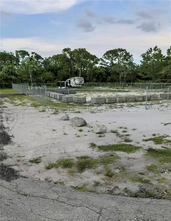 Prime 0.36-acre corner commercial lot offering outstanding visibility and excellent development potential in the growing Lake Placid market. This fully fenced & cleared parcel features city water and a highly desirable corner location, providing easy access and increased exposure for a variety of commercial uses. Whether you are looking to build your business, expand your portfolio, or invest in commercial land. this property presents an exceptional opportunity in a growing area.