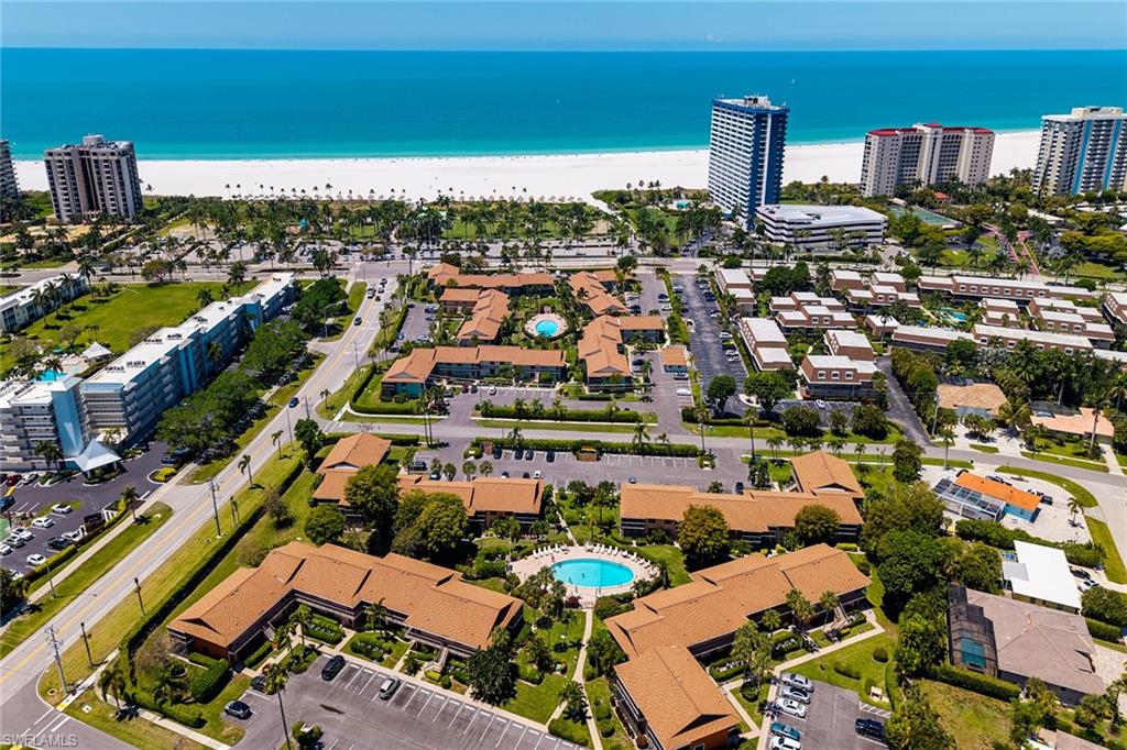 The Mariner complex is across the street from the beach. The condominium is ideally located upstairs in a quiet part of the community, overlooking the pool and facing west to enjoy Marco Island's beautiful sunsets. The cathedral ceiling and contemporary look set the tone for stylish relaxation in this well-maintained two-bedroom, two-bath residence. Ongoing updates and improvements keep it contemporary while maintaining the classic Mariner of Marco Island charm. The latest updates include a new dishwasher, a new hot water heater and a new A/C system. Plus, impact hurricane-resistant front doors and windows in each bedroom.