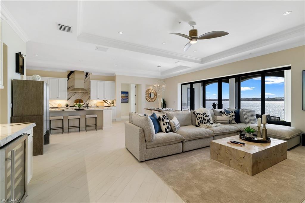 Discover refined lakeside living in this exquisitely renovated first-floor Ravenna residence, set within the prestigious gates of Miromar Lakes. Showcasing sweeping south-facing lake views and thoughtfully curated designer furnishings, this 3-bedroom, 3-bathroom home embodies effortless sophistication and modern comfort.
A seamless sense of style unfolds as you enter, highlighted by newly installed wood-look tile flooring throughout and sleek porcelain countertops in the kitchen, bathrooms, laundry room, and outdoor kitchen. Every element has been meticulously updated, from contemporary sinks and fixtures to elegant ceiling fans and refined finishes, creating a cohesive and timeless aesthetic.
The expansive primary suite serves as a serene private retreat, featuring custom-built closets that blend exceptional storage with elevated design. Designed to inspire, the gourmet kitchen is a chef’s delight, complete with a generous center island and a walk-in pantry with custom built-ins—perfect for both casual dining and entertaining with ease.
Seamless indoor-outdoor living awaits on the covered lanai, where a fully equipped outdoor kitchen invites alfresco meals and moments of relaxation against the backdrop of tranquil lake views.
As a resident of Miromar Lakes, enjoy access to an award-winning lifestyle anchored by a 700-acre freshwater lake ideal for boating, fishing, and water sports. The community also offers an infinity-edge pool, pristine white-sand beaches, a full-service marina, championship golf, lighted tennis and pickleball courts, a state-of-the-art fitness center, a luxurious spa and salon, and multiple waterfront dining venues.
This exceptional Ravenna residence presents a rare opportunity to experience the pinnacle of Southwest Florida living—where luxury, leisure, and breathtaking lakefront beauty converge in perfect harmony.
