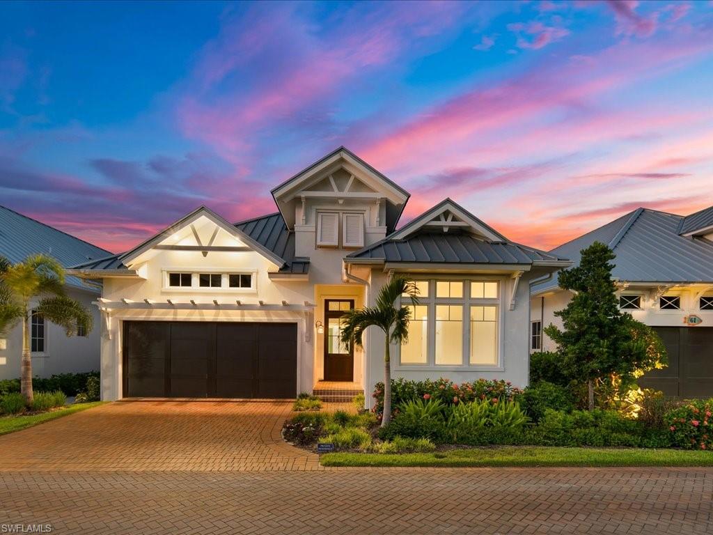 Enviably set in the sought-after boating community of Mangrove Bay, this recently completed home is a must see. Experience idyllic indoor-outdoor living with a stunning interior defined by high-end finishes and impressive entertainment areas. Walls of glass spill abundant natural light across the open layout. Top-of-the-line stainless steel appliances, stylish cabinetry, and an oversized island with seating inspire the avid cook to create gourmet meals. Indulge in ultimate relaxation in the sun-lit primary suite displaying two generous walk-in closets and a spa-like ensuite with a freestanding soaking tub and a walk-in shower. Enjoy relaxation on your covered terrace featuring electronic roll down screens, outdoor fireplace, and outdoor kitchen. When you're not taking a dip in the private pool or spa, explore all this boater's dream haven where you can launch your boat from your private boat dock, and experience direct access to the Gulf of Mexico. Mangrove Bay is a quaint luxury waterfront community with only 53 residences nestled along the Gordon River. Dining, shopping, and entertainment options along downtown 5th Avenue South and 3rd Street South are conveniently nearby.