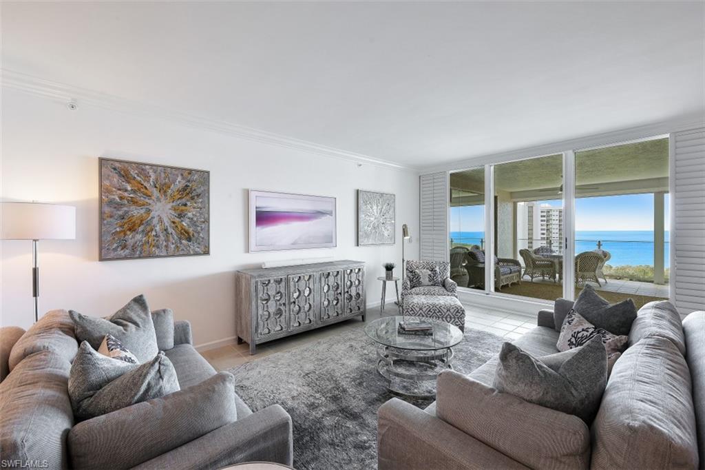 C7969 LUXURY BEACHFRONT CONDO ~ 3 BDRM/3 BATH stylishly updated condo in Baypointe at Naples Cay. This 12TH FLOOR CONDO offers spectacular views of the Gulf, Clam Bay & Venetian Bay. Just steps to the sand! NINE FOOT CEILINGS, NEW A/C Jan. 2023, NEW state of the art tv w/Sonos wifi sound bar in the living room, GE Monogram kitchen appliances, two dishwashers: Fisher & Paykel & GE. SubZero wine cooler. Freshly painted throughout. Two large lanai’s totaling nearly 600 SF ~ the west facing lanai offers Gulf and Clam Bay views, perfect for watching sunsets. The east lanai offers Venetian Bay and city views, perfect for watching sunrises. Baypointe is an amenity rich building renovated in 2018 ~ 3 guest suites, large sunset deck, social room with caterer's kitchen, state of the art fitness room, owner's lobbies with just 3 units per floor, kayak ramp and more. PET FRIENDLY building allows TWO PETS. Nestled between Park Shore and Pelican Bay, Naples Cay is a private, guard gated, beachfront community that offers a unique level of privacy and tranquility, yet is within walking distance to fine dining, shopping & entertainment of Venetian Village, Waterside Shops, and Artis-Naples.