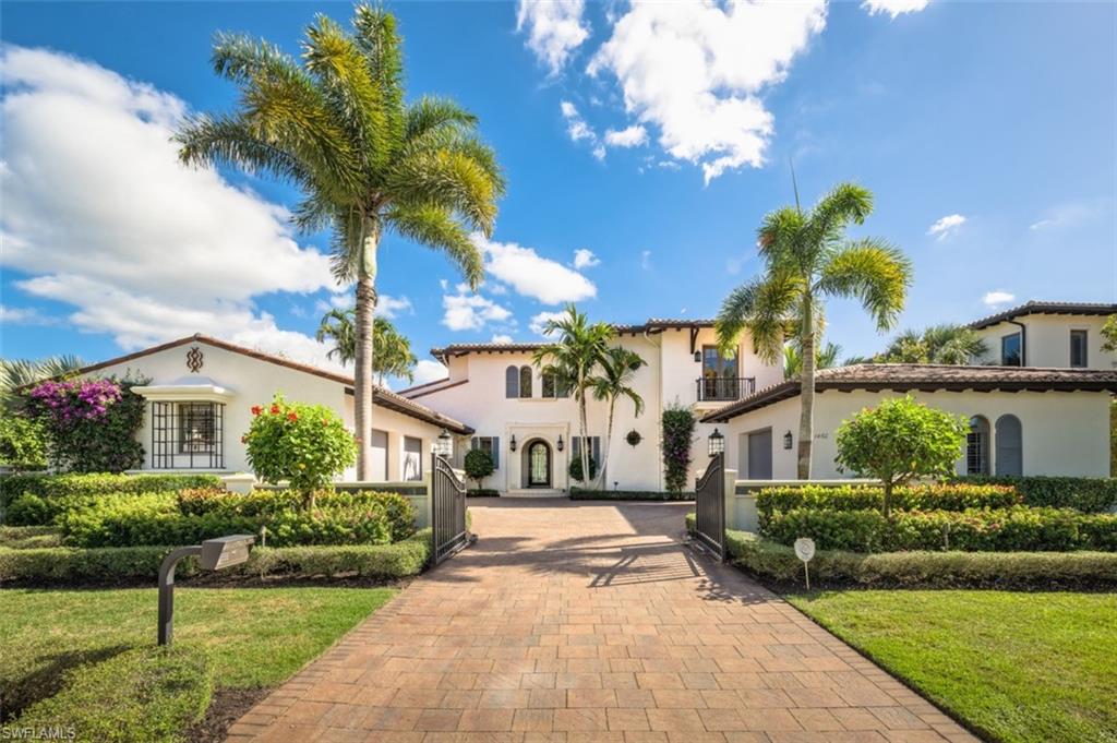 This gorgeous custom home is located in the exclusive Mirada neighborhood of Estuary at Grey Oaks. Featuring nearly 6,000 square feet of living space, this immaculate residence showcases high-end finishes and exquisite quality. A grand two-story foyer, four full bedrooms with en-suite bathrooms, dual studies, a chef's kitchen, and an expansive outdoor living area with resort-style pool and spa are just a few of the inviting features this home has to offer. The outdoor living area consist of a gas fire pit, outdoor kitchen and motorized screens overlooking magnificent lake and golf course views. No detail was overlooked with impact doors and windows, generator, Control-4 home automation and climate controlled 3 1/2 car garage. With the option of becoming a member of Grey Oaks Country Club you will have 54 holes of golf, newly renovated wellness center, lagoon style pool, tennis, pickle ball, bocce, restaurants, spa, and extensive amenities at your fingertips. All just minutes from downtown Naples world-class shopping fine dining and white sand beaches.
