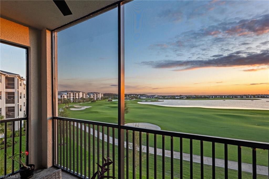 Welcome to The National Golf & Country Club in Ave Maria, where style, comfort, and breathtaking lake and fairway views across the Gordon Lewis–designed 18-hole championship golf course take center stage in this brand-new, unfurnished corner 3rd-floor condo with convenient elevator access. Perfectly positioned to capture the surrounding beauty, this light-filled residence offers added privacy and an abundance of natural light, creating a warm and inviting atmosphere throughout.

Featuring 2 bedrooms (king and queen) and 2 full bathrooms, the open-concept layout flows seamlessly into a spacious great room, ideal for both relaxing and entertaining. A cozy built-in fireplace adds charm, while the modern kitchen is equipped with quartz countertops, stainless steel appliances, and a large island with breakfast bar for effortless meal prep and gatherings.

The screened lanai provides a peaceful outdoor space to relax and take in the serene surroundings, offering a seamless connection to the stunning views.

The primary suite offers a walk-in closet and a private en-suite bathroom with a shower, while the second bedroom is conveniently located near a full bath, perfect for guests.

Additional highlights include in-unit laundry, assigned covered parking, golf storage, and the security of a gated community.

This unit includes a golf membership, a valuable benefit that is no longer offered with new unit purchases, making this an exceptional opportunity to enjoy full access to the community’s premier golf experience.

Residents enjoy access to exceptional resort-style amenities, including a resort pool, clubhouse dining, fitness center, spa, tennis and pickleball courts, and scenic walking and biking trails. Ideally situated between the Florida National Wildlife Preserve and Okaloacoochee Slough State Forest, outdoor enthusiasts will appreciate the natural surroundings, while Ave Maria’s Town Center, just minutes away, offers a variety of dining, shopping, and recreational options.

Conveniently located approximately 35 minutes from Gulf beaches and 45 minutes from Downtown Naples, this home offers the perfect blend of tranquility, convenience, and captivating views at every turn.