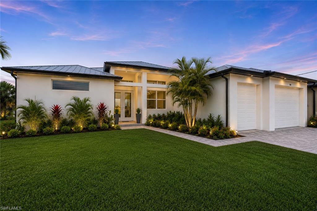 Indulge in the ultimate waterfront lifestyle with this masterfully crafted 4-bedroom, 3.5-bathroom custom estate completed in 2026. Situated on an expansive, picturesque lot, this architectural masterpiece offers rapid, unrestricted Gulf access that places the white sands of Sanibel Island just a breathtaking 20-minute boat ride from this gulf access home. Facing West, enjoy the beautiful cotton candy sunset sky nightly!  Built to the highest modern standards, crowned with a sleek metal roof, brand new sea-wall and featuring a large attached 3-car garage!  The storage is plentiful and the garage space is perfect for vehicle and water toy storage, the residence showcases meticulous craftsmanship where absolutely no detail has been overlooked. The ceilings are soaring, the bedrooms are large and it is almost 2500 sqft under truss.  This property serves as your private gateway to Southwest Florida, a true tropical paradise celebrated worldwide for its crystal-clear waters, world-class fishing, and pristine, sun-drenched beaches. The heart of the home features a state-of-the-art chef’s sanctuary outfitted with premium, high-end finishes designed for flawless entertaining. The sophisticated floor plan is highlighted by two palatial master suites, with the secondary master suite specifically engineered with direct pool bath access for effortless indoor-outdoor living. The primary master oasis serves as a jaw-dropping visual centerpiece designed to turn heads.  Easy living in a prime part of town!  Easy and a joy to show!