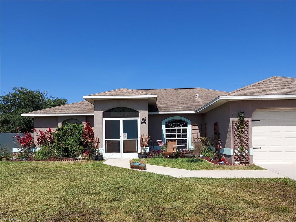 Great home centrally located. This 4 bedroom, 2 bath Baywood home is ready for you to start your next chapter. Home currently has an above ground pool, large backyard, completely fenced for privacy. Plenty of room to build a pool, if desired. Split floor plan features a large master suite with walk in closet, dual sinks and a separate shower and tub. Updated baths and kitchen with custom cabinets, soft close doors and drawers. No carpet, tile and luxury vinyl flooring throughout. Excellent neighborhood, near Kurt Donaldson Community Park and Hancock Tennis Center. Close to shopping centers, restaurants, Cape Coral hospital, supermarkets, and easy access to I-75. All assessments are in and paid. No flood insurance required.