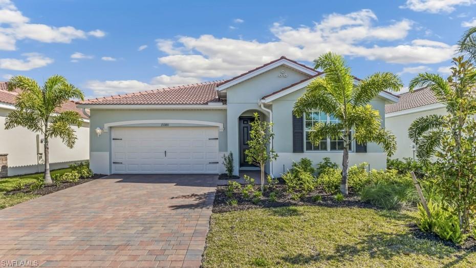 One or more photo(s) has been virtually staged, AI generated or rendered.  The Palmetto Landing Community presents the Clifton floor plan. Boasting a serene setting with a picturesque lake view, this 3-bedroom, 2-bathroom, 2-car garage 1-story home offers a true open concept experience. With its modern amenities like Impact Windows, Gas Range, Tankless water heater, and high-end Cabinets paired with the elegance of quartz countertops and wood plank tile flooring, every detail exudes sophistication. The open kitchen layout seamlessly flows into the spacious living and dining areas, ideal for hosting gatherings or simply relaxing in style. The property's potential for a future pool further elevates its appeal, offering a personal oasis right at home. Residents of Palmetto Landing can indulge in a plethora of community amenities, from the clubhouse's social and game rooms (with pool table & TV’s) to the resort-style beach entry pool with lap lanes and fitness center. With its convenient access to Babcock Ranch's shopping, dining, and entertainment options, this home is a harmonious blend of comfort and sophistication, promising a lifestyle of unparalleled convenience and luxury.