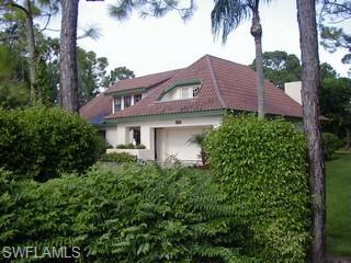 MOTIVATED SELLER! BRING ALL OFFERS! Lots sell at $500,000 plus so consider this great VALUE! Located in one of the most sought after family neighborhoods in North Naples. Mercato only 5 minutes away. Across the street from the elegant Waterside shops, Naples Philharmonic, and beautiful beaches less than 3 miles away. "A" rated schools , Pelican Marsh Elementary, Pine Ridge Middle and Barron Collier High School. Charming English Tudor-style home on large choice 1.36 acre lot with room to build a guest home! NEW Air Conditioners & Water Heater. Master Bath has footed Tub overlooking private Garden Area and a Spacious separate Shower. Oversized Heated Pool & Spa, Custom pavered deck with lighted paver insets, Spacious Private Sun Tanning Balcony plus 3 additional balconies from each bedroom. Custom woodwork, crown molding, wood, tiled & carpeted floors (new carpet in Master) and so much more!  A must see on your list of homes in this price category.
