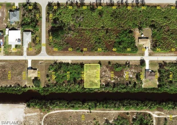 Prime residential lot located in the desirable Port Charlotte area, offering an excellent opportunity to build your dream home or investment property in one of Southwest Florida’s fastest-growing communities. This spacious lot is situated in a peaceful neighborhood surrounded by newer homes, waterfront properties, and beautiful natural scenery. Enjoy privacy and convenience with easy access to shopping, dining, schools, golf courses, parks, marinas, boating, fishing, and Gulf Coast beaches.
This property provides plenty of space for a custom single-family residence with room for a pool, outdoor entertainment area, or tropical landscaping. Convenient access to major roads and nearby cities makes commuting simple while still allowing residents to enjoy the relaxed Florida lifestyle. Nearby amenities include public boat ramps, nature preserves, walking trails, medical facilities, and recreational attractions.
Port Charlotte continues to experience strong residential growth and development, making this lot an outstanding opportunity for builders, investors, or future homeowners looking to secure property in an expanding market. No HOA fees and no mandatory deed restrictions provide added flexibility for future plans. Whether building now or holding as a long-term investment, this property offers excellent potential in a desirable Charlotte County location.
Enjoy year-round sunshine and easy access to nearby destinations including Punta Gorda, Englewood Beach, Boca Grande, and Fort Myers. Residents can take advantage of nearby shopping centers, local restaurants, golf communities, parks, fitness centers, and waterfront entertainment. This property is ideal for those seeking the Florida lifestyle with boating, fishing, kayaking, and outdoor recreation just minutes away. Great opportunity to own land in a growing area with increasing demand for residential development and future investment potential. Don’t miss the chance to secure your place in beautiful Southwest Florida.