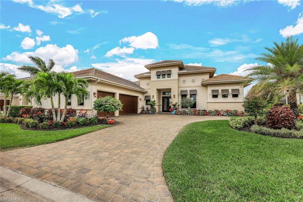FULL GOLF MEMBERSHIP INCLUDED! LIVE A VACATION LIFESTYLE IN ESPLANADE! This impressive Stock built "Glenmore" home (1 of only 42 in Esplanade) is situated on a spacious .37 acre, 112' wide lot (largest in the community) overlooking the lake and 11th fairway and is being sold FURNISHED & DECORATED! The elegance of this home starts outside with a grande elevation complete with lush landscaping, flat tile roof, soffit & landscape lighting, and wrought iron front doors. Inside, you are greeted with an open Great Room style floorplan, 15' ceilings, 10' sliding glass doors to the lanai, and a generous kitchen with oversized center island. Enjoy the Florida sunshine around the custom salt water, gas heated pool complete with water bowls, raised spa, sunshelf and tons of deck space for sun lounging. Enjoy outdoor living as its finest with dedicated living & dining areas, outdoor kitchen, and built-in gas fireplace all protected by electric roll down hurricane screens. Southwest rear exposure means direct sunset views during the cool winter months. A long list of special features include: HURRICANE IMPACT WINDOWS/DOORS; Liquid cooled WHOLE HOUSE GENERATOR; AC GARAGE with cabinetry; tile floors throughout and wood look flooring in the bedrooms; custom built-in cabinetry; custom master closet built-ins; custom window treatments throughout; special order chandeliers; spacious kitchen complete with quartz countertops, Kitchenaid built-in appliances including gas range, wall ovens, warming drawer, beverage cooler, and Sub-Zero refrigerator; custom wallpapered accent walls & baths; and more! Esplanade is a true "Lifestyle Community" with something for everyone: resort pool complete with cabanas & poolside "Bahama Bar"; tennis; pickleball; bocce; Koquina Day Spa; fitness center; dog parks; 14 miles of bike/walking trails; 18 hole private golf course; 15,000 Sq Ft clubhouse featuring restaurant, bar, wine tasting room, wine lockers, & Starbucks style cafe! All of Esplanade's amenities, property landscaping/irrigation, and golf membership dues total just $1,118/month! No additional fees/memberships required!