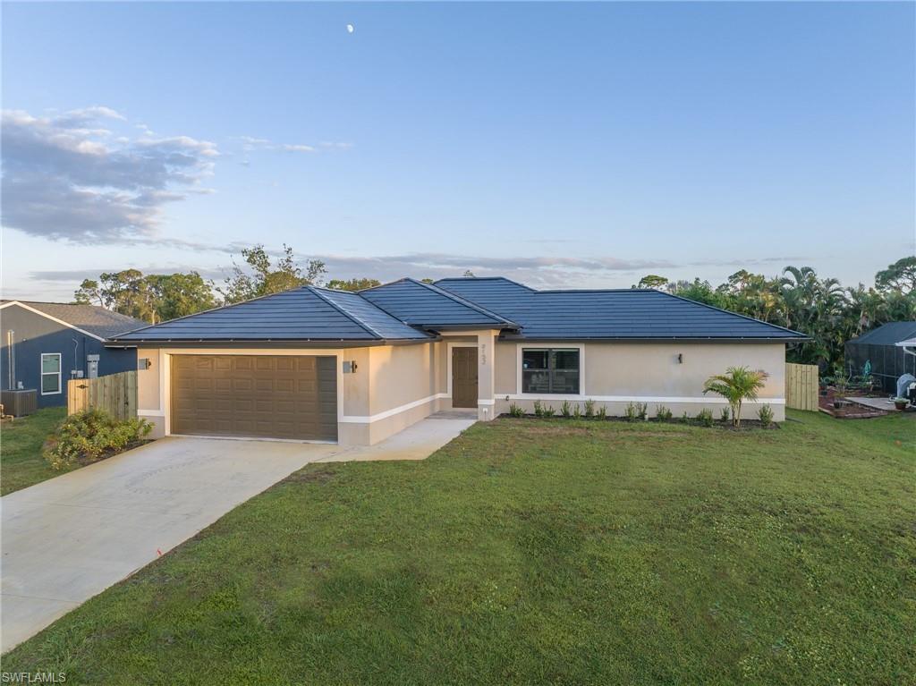 TURNKEY FURNISHED AND A TESLA SOLAR POWER ROOF! Built in 2023, this exceptional 4-bedroom, 2-bathroom San Carlos Park residence offers the comfort and peace of mind of newer construction, along with advanced technology, remarkable energy efficiency, and outstanding versatility for both homeowners and investors.

The sleek Tesla Solar Roof seamlessly integrates solar technology directly into the roof tiles, creating a clean, sophisticated appearance while harnessing Florida’s abundant sunshine. The system currently generates more electricity than the home consumes, resulting in no monthly electric bill based on the home’s present usage. This exceptional benefit can provide substantial ongoing savings for a full-time resident while also reducing operating expenses and improving potential returns for a rental investor. Additional high-performance features include open-cell spray foam insulation, hurricane-impact windows, a heat-pump water heater, a 16 SEER HVAC system, a Tesla EV charger, Energy Star appliances, and smart AI security cameras.

Designed for comfortable everyday living and effortless entertaining, the open-concept interior centers around an expansive kitchen with an oversized island, abundant workspace, and plenty of room for family and guests. The spacious four-bedroom layout provides flexibility for a growing family, visiting guests, a home office, or dedicated rental accommodations.

For end users, this home offers a modern, low-maintenance lifestyle with furnishings already in place, making it ideal as a primary residence, seasonal retreat, or second home. For investors, the property offers a proven short-term rental history and the ability to continue operating as an established income-producing asset without the expense and uncertainty of furnishing or upgrading an older home.

The centrally located San Carlos Park setting provides convenient access to Southwest Florida International Airport, Florida Gulf Coast University, Gulf Coast Town Center, Miromar Outlets, Coconut Point, renowned restaurants, entertainment, and Southwest Florida’s beautiful beaches.

Whether you are searching for a nearly new Florida home to enjoy yourself or a turnkey property with demonstrated rental potential, this residence delivers a compelling combination of location, efficiency, technology, comfort, and investment value. Newer construction, no monthly electric bill based on current usage, turnkey convenience, and strong income potential make this a property that truly stands apart.