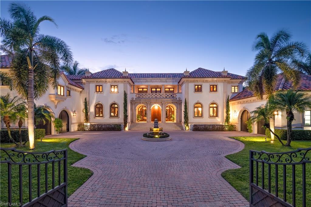 A home in the European tradition with extraordinary attention dedicated to the details. Standing proof that beauty and grace can be achieved without compromising any of the modern amenities and structural innovations so important to modern buyers. The home is situated on one and one half Port Royal lots, with wonderful western views over Hidden Bay.  Each room is focused on promoting its unique purpose without sacrificing luxurious comfort. Living areas include a glorious two-story great room with immense fireplace, beautiful two-story library with spiral staircase, five large ensuite bedrooms, large art studio or sixth bedroom, stunning dining room, spacious family room with wet bar, and significant covered lanais overlooking the pool and abundant green space leading to the waterway beyond. Two separate two-car garages. Port Royal Club membership eligibility.