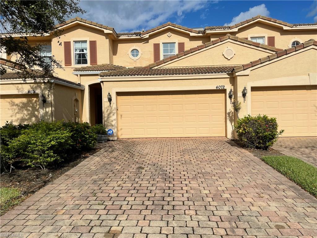 WOW!!! 2 bedroom, 2.5 bath town home in San Simeon Community is centrally located to shopping, I75, RSW airport, downtown Fort Myers and many other SWFL attractions. This home has many upgrades including, newer Samsung appliances, newer plush carpet upstairs in the bedroom and hallway, laminated wood flooring on first floor, dual sinks in master, soaking tub with separate shower, en-suite bath in second bedroom, junction box in garage to power generator, resealed garage floor, newly painted garage walls, garage folding screen enclosure, newer stackable Whirlpool washer and dryer, and ADT alarm monitoring system. The community is gated with a clubhouse, fitness center, resort-style pool, tot lot play area and much more.