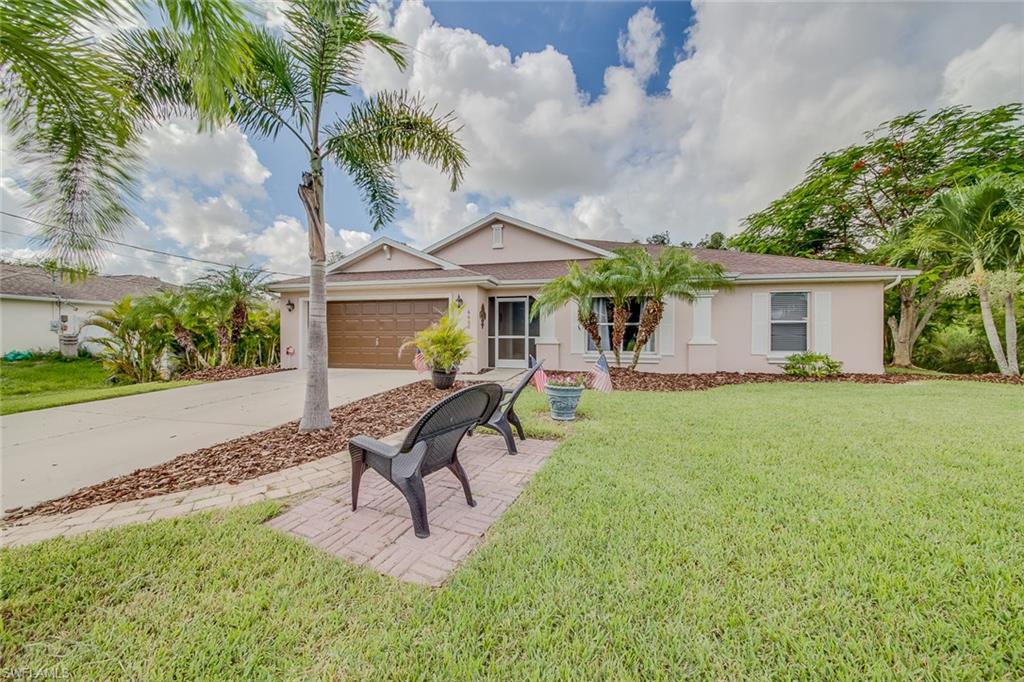 DON'T MISS OUT on this SPACIOUS home, IDEALY LOCATED in this QUIET Central Fort Myers neighborhood with NO HOAs! This magnificent 3 Bedroom PLUS Den, 2 Bath home will dazzle you. The beautiful flooring leads you from the foyer into the on-trend and highly desirable OPEN FLOOR PLAN living space. The Kitchen will not disappoint with an awesome breakfast bar and abundant storage. The living area is bright and open, flowing perfectly into your Florida room, ideal for entertaining your guests. The large Den is tucked away in the front of the home, complete with French Doors to give you privacy/flexibility. The separate computer nook is an ideal spot! Enjoy two guest bedrooms and a bathroom with dual sinks, separated to give more privacy. The Master suite an oasis with access to the Florida room, a huge walk-in closet, and a bath with a posh jetted tub, walk-in shower, and dual sinks! Updated fixtures and fans, new refrigerator, dishwasher, washer and dryer. Whole-house alarm! Your new homes' interior details are just the beginning, as you adventure outside enjoy the backyard paver patio, private fenced rear yard with room for a pool, and room on the side for an RV or boat if you desire.