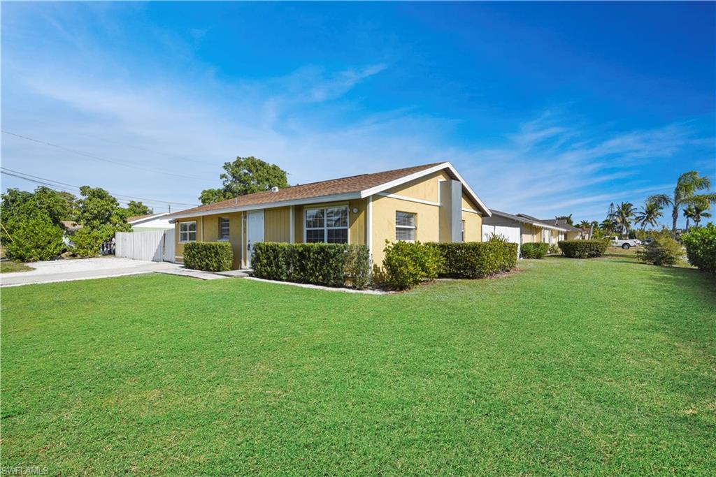 Hard to find 3 Bedroom 3 Bath at this price are hard to come by. This This unique corner lot property will not last long. It has a 1/1 apartment and the main residence is a large 2/2. Live in the 2/2 and rent out the attached apartment! The large fenced in yard also boasts a shed with ample storage space. Naples Twin Lakes has an unbeatable location, no HOA fees, or restrictions! Fenced in area on the side yard is perfect for parking your boat.