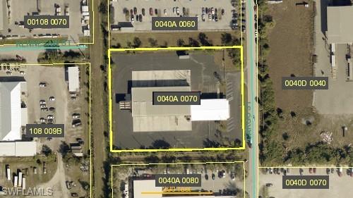 Industrial warehouse property built in 1980. This commercial facility is situated in Fort Myers’ industrial corridor near the airport district. The property features convenient access to major transportation routes and is surrounded by freight, logistics, and distribution businesses. Ideal for warehousing, distribution, or light industrial operations.