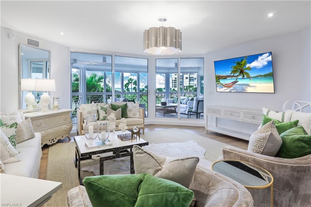 C13120 This extraordinary beachfront residence has been beautifully updated and fully furnished by Joy Tribout Interiors of St Louis.  Beginning with enhancements to the original floorplan to complement today’s beach lifestyle, the design team has brought together the highest level of finishes and fixtures to deliver the epitome of luxury and elegance.  Encompassing 3,944 total sq ft, the spacious floorplan offers 4 ensuite bedrooms, two covered lanais, and a large great room with adjoining den, well equipped kitchen and dining area which are perfect for entertaining family and guests.  The updated  kitchen features custom cabinetry with brass pulls, F. Bertazonni stove, and upgraded appliances with extra beverage drawers.  With a sweeping view to the Gulf, the primary suite enjoys a spacious and beautifully appointed bath and grand walk- in closet. An added benefit are the extra storage rooms and 2 assigned underground garage spaces.  The Brittany offers an updated fitness center, 4 quest suites, tennis courts, beach side lap pool with barbecue pavilion and 24 hour security.  Perfectly located within a short stroll to the wonderful restaurants and shops at Venetian Village.