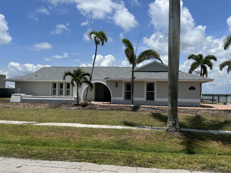 Fantastic lot with forever views of the river and Bird Islands on Marco Island. With almost 160 feet of seawall, this gorgeous piece of property allows for dock placement for unobstructed views. The river area offers great boating and easy on/off of the island.  Build your forever dream  or update this perfectly livable solidly built home.