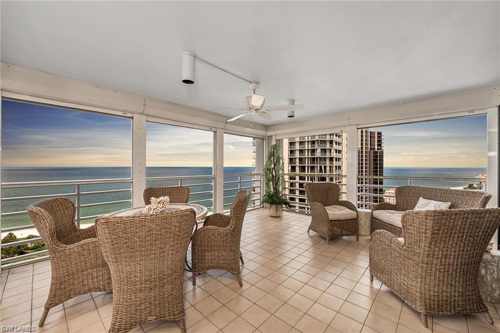 C5532 - Breathtaking views surround you from this top-floor penthouse. Floor to ceiling windows, sweeping views of the Gulf and bay.  A true three bedroom with the primary tucked away. The primary and family room have direct access to the 40-foot open balcony. Spacious kitchen with upgraded cabinets, granite countertops, and an eat-in area. Updated bathrooms with seamless shower doors. The Terraces has a dramatic multistory entry and a social room with a full catering kitchen, fitness center, and spectacular pool with outdoor kitchen and fire pit area. Follow the winding brick pathway to the beach or the walkway above it. Enjoy shopping and dining at nearby Venetian Village.