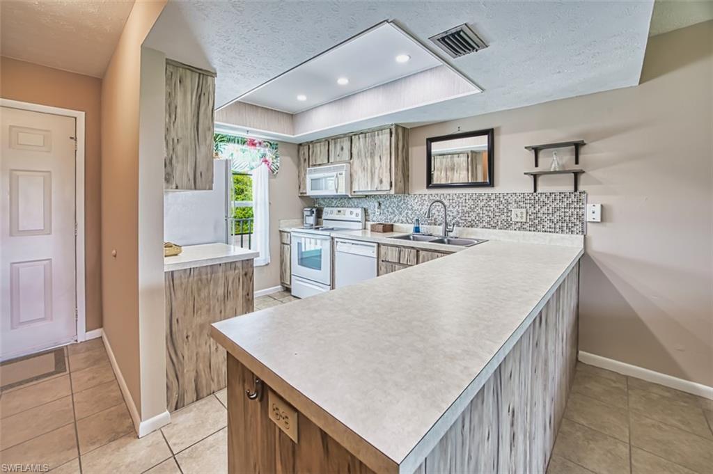 SANIBEL WAY CONDO - Residential