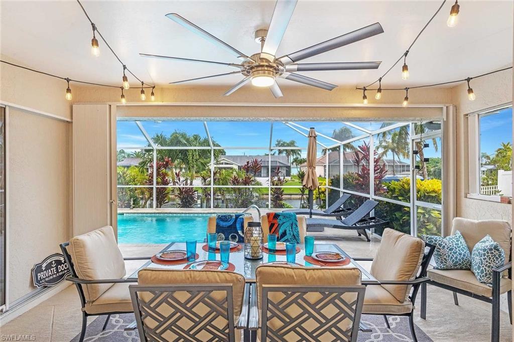 This is a VACATION RENTAL only. Owner will not consider annual rentals. Weekly rentals are welcome.
Villa Annabella is a 3-bedroom, 2-bathroom property on a gulf access canal with an electric-heated pool. This home sleeps a maximum of 8 guests (including children) and is not pet friendly. Please note: The boat lift is NOT available for guest use.

· · · · · PROPERTY PERKS · · · · ·
- TV on lanai
- Fenced yard

· · · · · LOCATION · · · · ·
- Located in Southeast Cape Coral
- Close to Horton Park & Boat Ramp
- Close to Four Mile Cove Ecological Preserve
- Close to Del Prado Blvd. with plenty of shopping & dining
- A short drive to Veterans Parkway, which leads you to Fort Myers/Fort Myers Beach

· · · · · LIVING AREAS · · · · ·
- Flat-screen TV
- Comfortable seating
- Electric fireplace
- Office with desk setup & sliders to the pool

· · · · · KITCHEN & DINING · · · · ·
- Fully equipped
- Dining area with seating for 6

· · · · · BEDROOMS · · · · ·
- Primary Bedroom: King bed & flat-screen TV, attached "game room" with Queen murphy bed with farmhouse sliding doors to separate spaces
- 2 Guest Bedrooms: Queen beds in each

· · · · · BATHROOMS · · · · ·
- Primary Bathroom: Soaking tub, glass walk in shower & dual-sink vanity
- Guest Bathroom: Shower only & single sink vanity

· · · · · OUTDOOR LIVING · · · · ·
- Electric heated pool
- Southern pool exposure
- Dining area with seating for 6
- Sun loungers
- TV on lanai
- Grill

· · · · · THIS HOUSE IS GREAT FOR · · · · ·
Families looking for space for everyone, close to shopping & dining