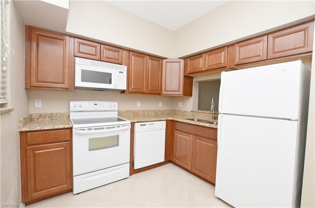 Must see this newly upgraded, renovated condo!  Brand new GRANITE counter tops, brand new (and really nice) wood cabinets.  Brand new 18 inch diagonal tile.  Brand new carpet in the bedrooms.  Completely and professional repainted with tasteful, neutral colors.  Brand new deep sink with sprayer in the kitchen.  AC recently replaced.  Wonderful and private view from your lanai overlooking trees and bushes.  Short walk to the spacious pool and modern fitness center as well as a short walk for guests needing extra parking.  The Cove at Six Mile is an incredible value right now located in the midst of an exciting and growing area of Fort Myers with plenty of shopping and things to do.  Ideally situated with easy access to the airport, beaches and popular Fort Myers attractions.  The very low HOA fees are an added bonus.  Great for a private residence, investor or vacation home.