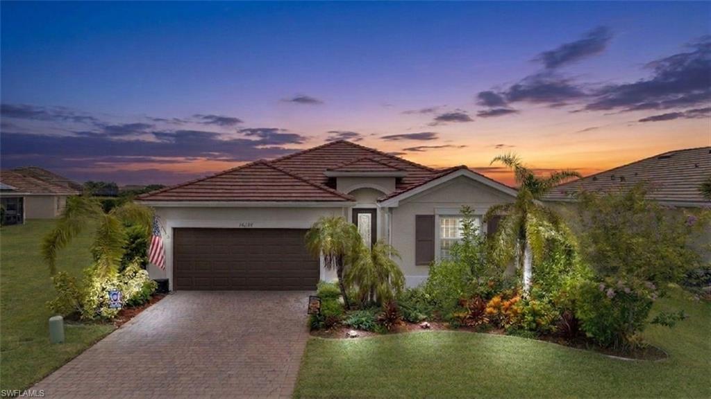 Welcome to your piece of Southwest Florida paradise in the highly sought-after Hampton Lakes at River Hall! Situated on a peaceful waterfront homesite, this beautifully maintained home offers stunning lake views and the perfect place to enjoy your morning coffee while watching the sunrise over the water.

Step inside to discover upgraded flooring, a bright and spacious open-concept layout, and plenty of room for family and guests. The extended screened lanai creates the perfect outdoor living space for relaxing, entertaining, or simply taking in the tranquil waterfront setting. Pride of ownership shines throughout this exceptionally well-maintained home, making it truly move-in ready.

Conveniently located just minutes from I-75, you'll enjoy easy access to shopping, dining, entertainment, Southwest Florida International Airport, downtown Fort Myers, and the area's beautiful Gulf beaches.

Living in Hampton Lakes means enjoying a true resort-style lifestyle with a low HOA and exceptional amenities, including a resort-style pool, clubhouse, state-of-the-art fitness center, tennis courts, pickleball, bocce, playground, walking and biking trails, and an active calendar of community events.

Whether you're looking for a full-time residence or a seasonal retreat, this waterfront gem offers the perfect combination of comfort, convenience, and Florida living. Don't miss your opportunity to own in one of Southwest Florida's most desirable communities!