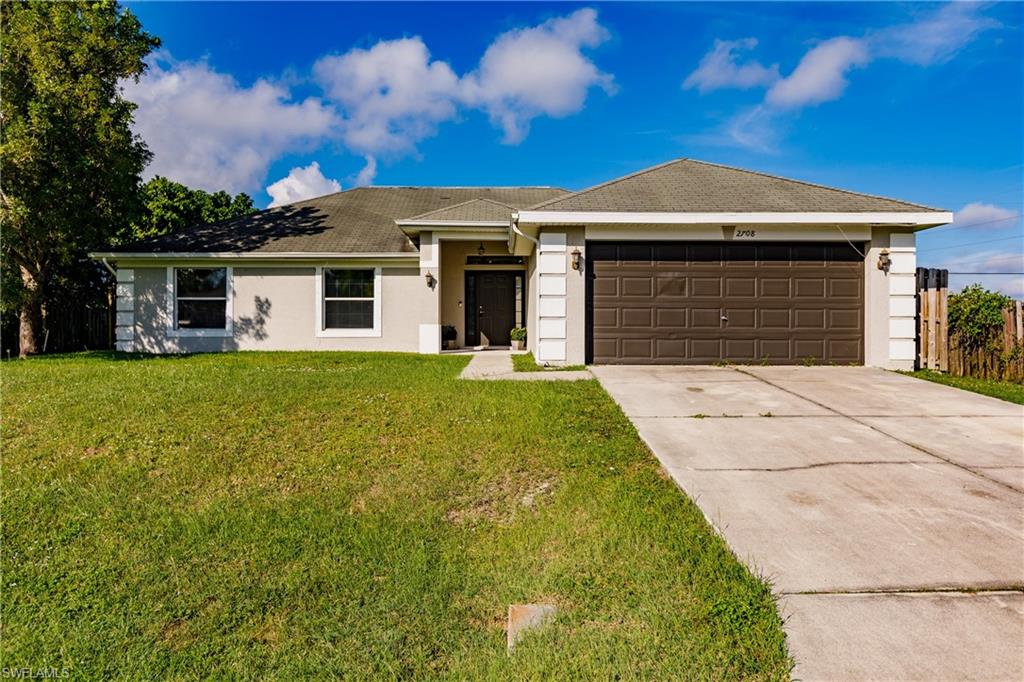 MULTIPLE OFFERS RECEIVED, HIGHEST AND BEST ENCOURAGED ASAP. Welcome home to this spacious 4 bedroom single family in an area surrounded by beautiful new construction. High ceilings with open floor plan and newly installed wood look flooring. Kitchen boasts stainless steel appliances, breakfast bar, and spacious pantry. Master suite with large en-suite with walk-in closet, separate water closet, linen closet, his/her sinks, and large tiled, walk-in shower. Split floor plan with 2 private guest rooms, and modern guest bath. Washer/Dryer hookup in separate laundry room with plenty of storage space. Fully fenced backyard with large patio perfect for relaxing and plenty of green space. Recently updated well equipment and professional pest management control in place. Minutes away from shopping, dining, and Publix on your way home.