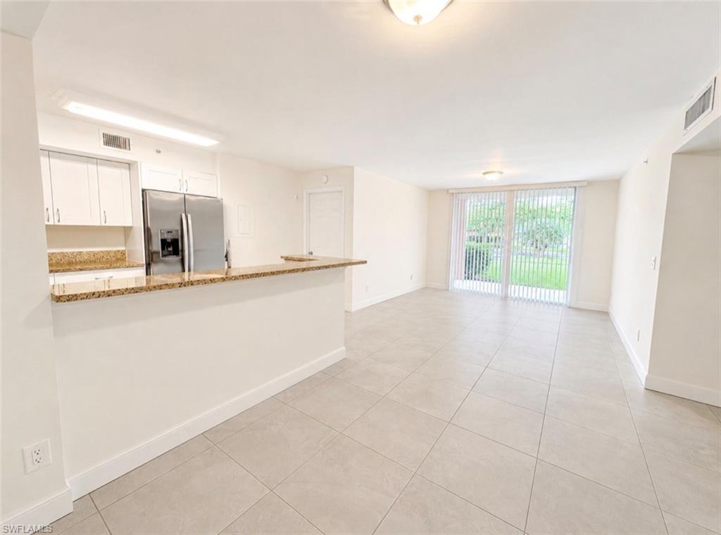 ANNUAL RENTAL AVAILABLE! Welcome to this beautifully maintained first-floor condominium located in the desirable Wildwood Lakes community in Naples. This spacious 2-bedroom, 2-bathroom condo offers an open-concept floor plan with abundant natural light. The Enclave at Naples offers residents access to community amenities, including a pool, clubhouse, and beautifully landscaped grounds. Conveniently located just minutes from downtown Naples, Gulf beaches, shopping, dining, schools, and major roadways.