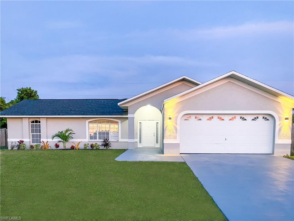 Beautiful, Exceptional, Spacious 3-bedroom, 2-bathroom home on oversized lot offering endless possibilities for the biggest pool and a boat. Built in 2002 completely updated in 2023, includes brand new roof, new 44”x 44” tiles throughout, stunning new kitchen with quartz countertops, all new stainless-steel appliances, updated bathrooms, accentuated by volume ceilings, screened lanai, two-car garage with auto open doors, city water and sewer with all assessments paid.  It is centrally located to downtown Cape Coral for shopping, dining & entertaining, close to Midpoint and South Point bridges allowing easy access to Fort Myers and I-75. This magnificent and strong built home was not affected by hurricane Ian. It is zoned X500 allowing for highest discount on flood insurance, according to FEMA December 2022.