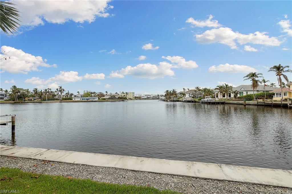 One of the best waterfront building sites with western exposure in the Moorings. Wide water views of sunsets and brand-new sea wall, the property is available to build your dream home. Also includes membership to the private Moorings Beach Park.
