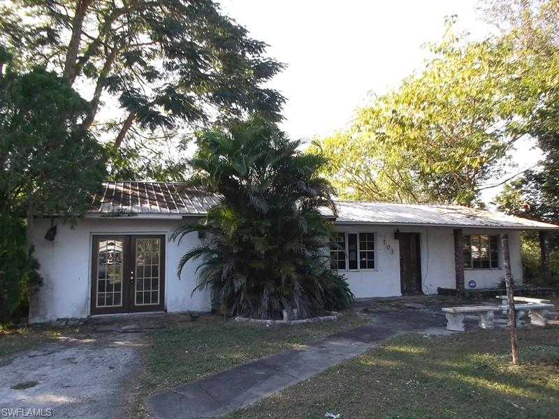 Spacious 3 bedroom, two bath home located in Immokalee.  Additional rooms include family room, den, and inside utility room. Chain link fenced back yard, oversized two car garage, and lanai.  Vaulted ceilings, metal roof, and central utilities. This is a Fannie Mae HomePath property. First time homebuyers may be eligible to receive 3% closing costs assistance. Please see attached flyer for additional information.