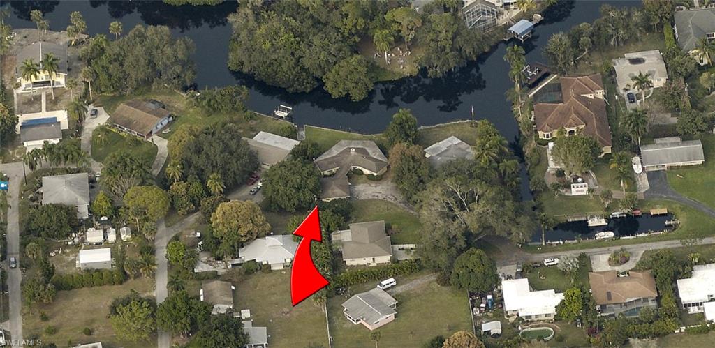 Mesmerizing RIVER Views Abound from the Wrap-Around Lanai. This Well-Built Home is Nestled on an OVER-SIZED Estate Lot complete with Seawall for Your Impromptu Boating Adventures to the Gulf of Mexico.
Just grab Your Fishing Pole & Picnic Basket for a Fun-Filled Day of Heart-Warming Memory Making that will Delight for a Lifetime. Life is Short, Start Living Your Dream NOW!
 PLEASE CHECK OUT THE DETACHED 3 CAR GARAGE TOO.   
This Home is VERY EASY to Show.