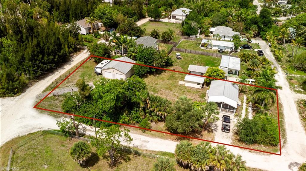 Welcome to your dream island retreat at 7257 Victory Rd in charming Bokeelia, FL! This beautifully remodeled 2-bedroom, 1-bathroom home is nestled in the serene enclave of Pineland, at the north end of Pine Island. Situated on a.42 acre lot, this home boasts modern upgrades including stainless steel appliances, tile floors, impact windows and doors, and a newer central A/C system. Enjoy peace of mind with updated electric panels and a durable metal roof. The spacious 24' x 38' garage with a newer shingle roof offers endless possibilities while the large screened porch invites you to unwind. Explore nearby marinas and boat ramps, or savor the delightful local dining. Perfect for nature lovers and boating enthusiasts! Don’t miss this gem! THIS. HOME HAS NOT FLOODED.